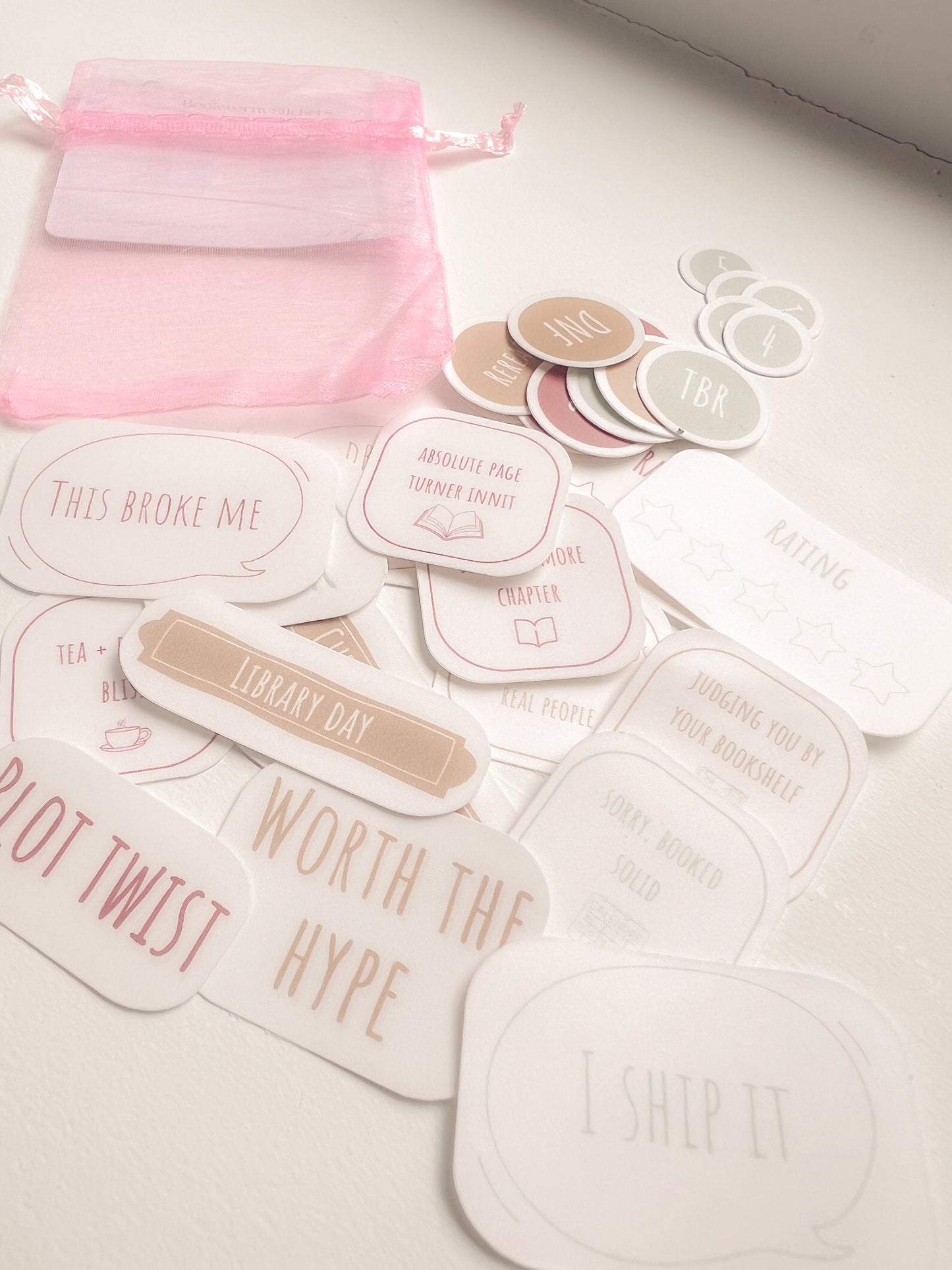 Set of book and reading inspired stickers with text on a light surface